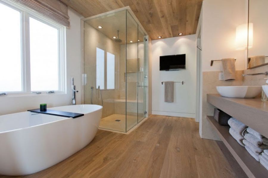 Bath with freestanding tub and wood-plank ceiling