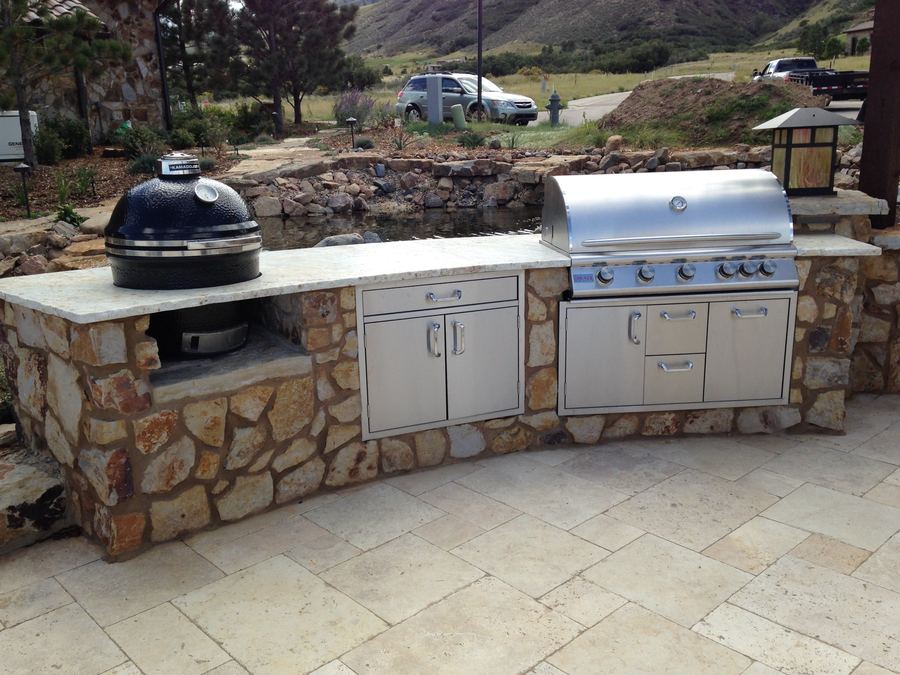 Fieldstone outdoor kitchen with built-in grills